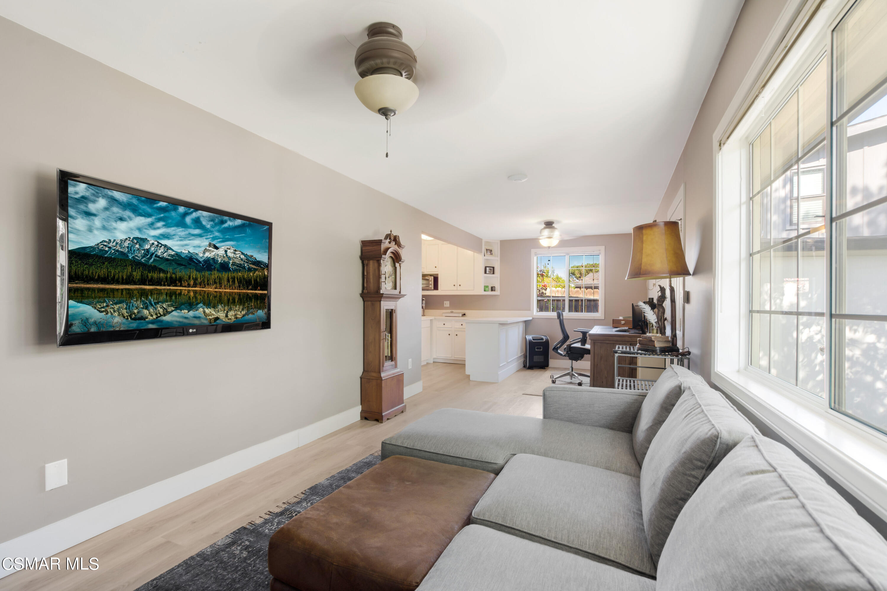 888 Rancho Road Thousand Oaks, CA 91362 - Photo 30 of 44 a living room with furniture a flat screen tv and a large window