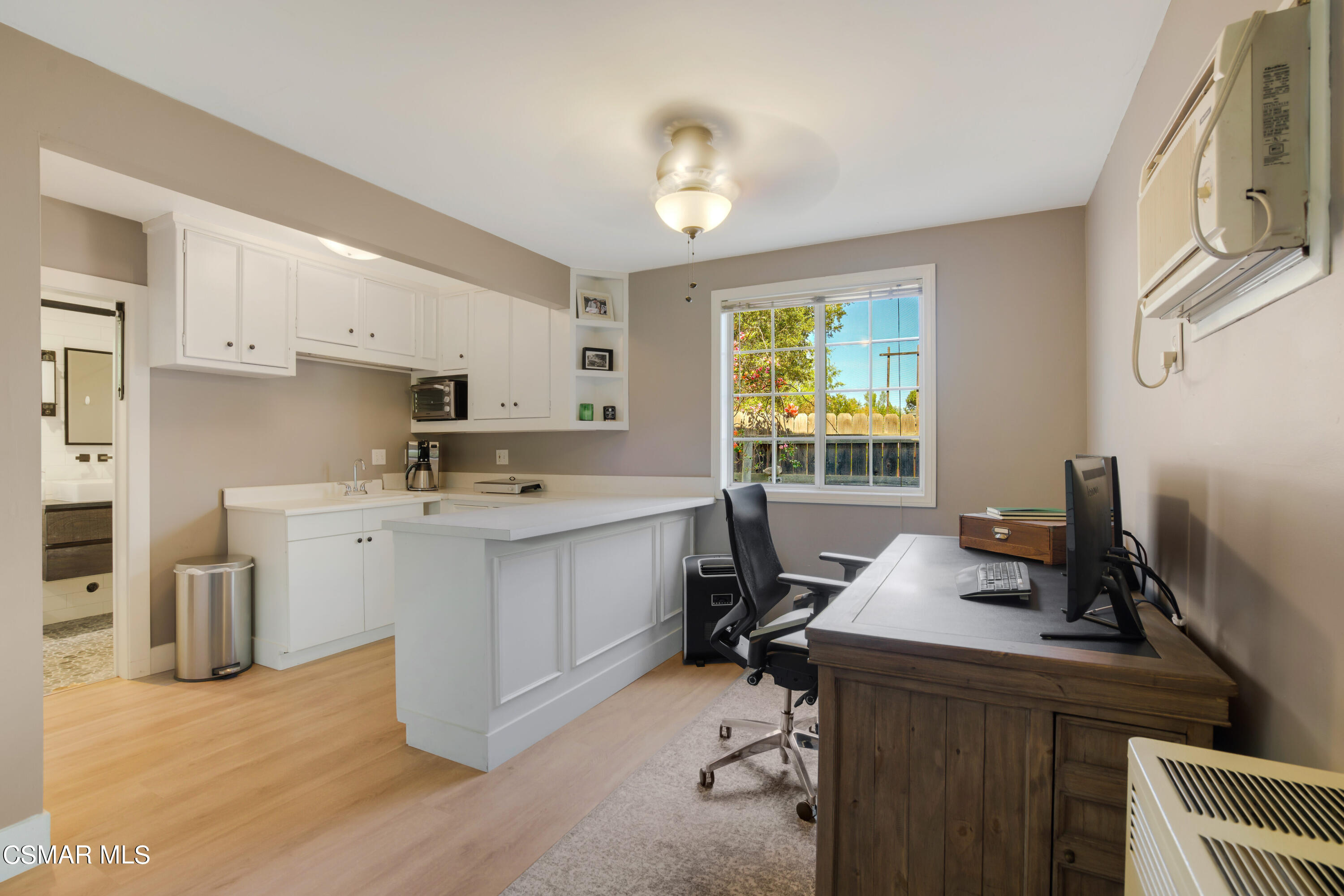 888 Rancho Road Thousand Oaks, CA 91362 - Photo 31 of 44 a view of a kitchen with appliances and a window