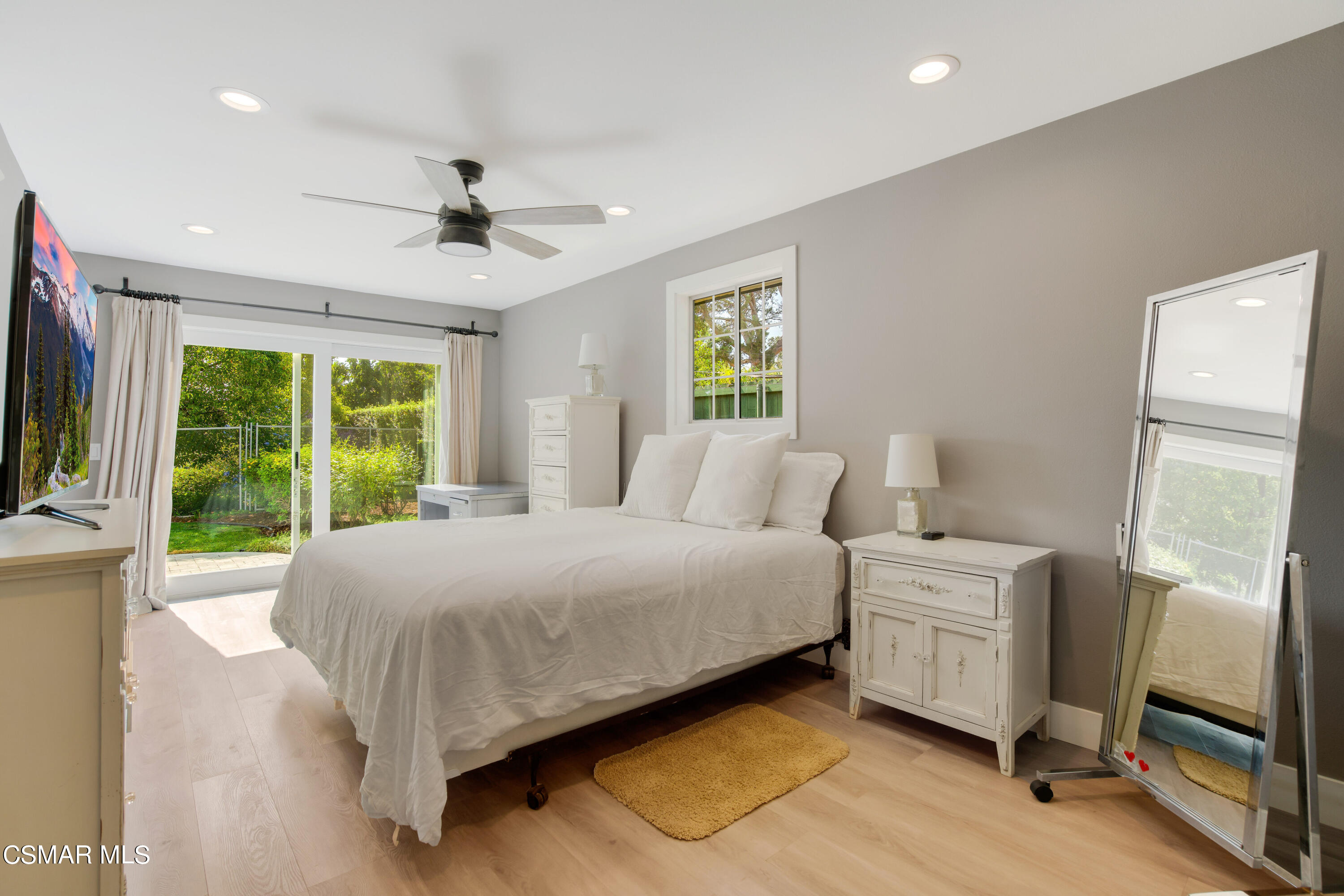 888 Rancho Road Thousand Oaks, CA 91362 - Photo 33 of 44 a bedroom with a bed window and a flat screen tv