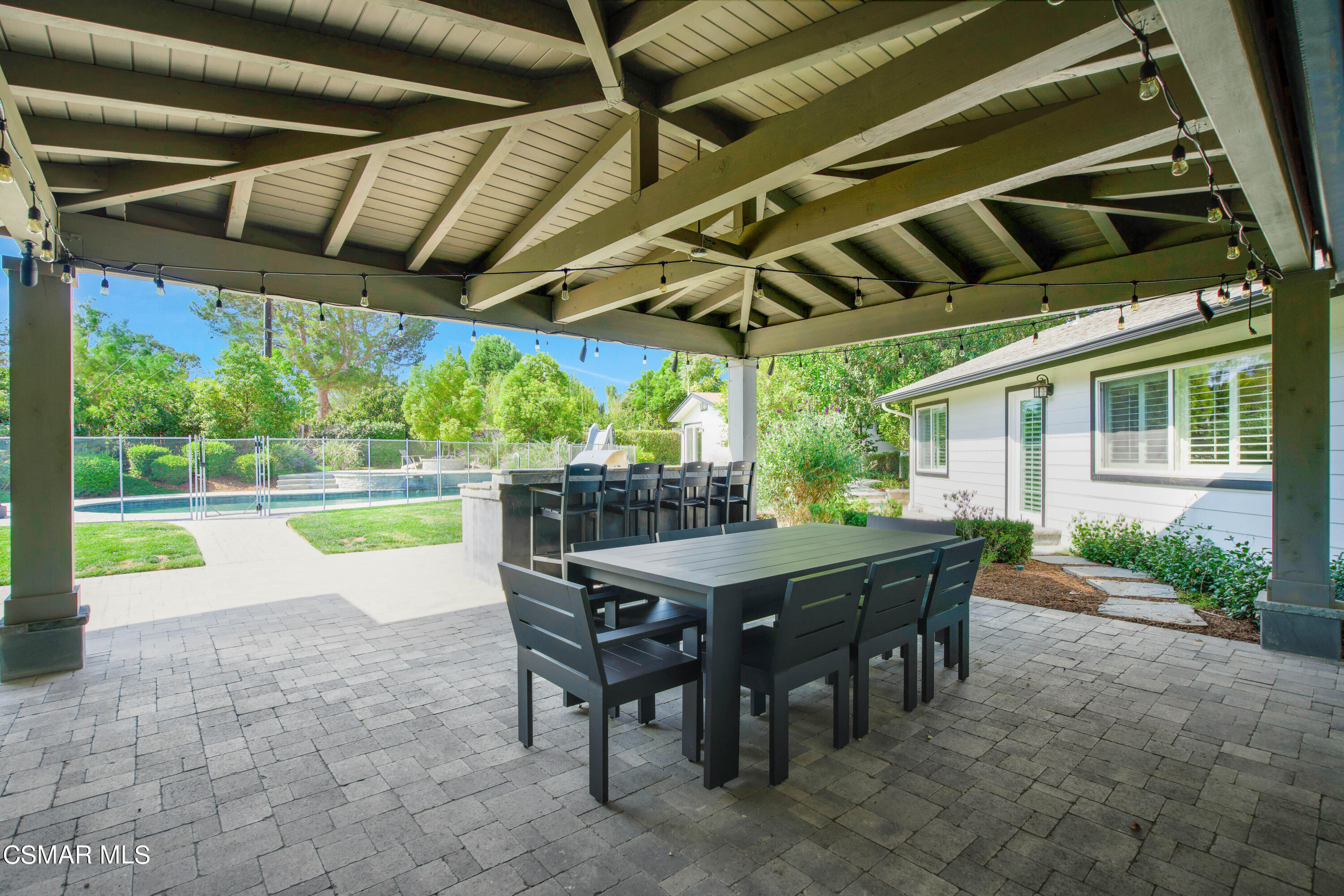 888 Rancho Road Thousand Oaks, CA 91362 - Photo 35 of 44 a view of a table and chairs in patio