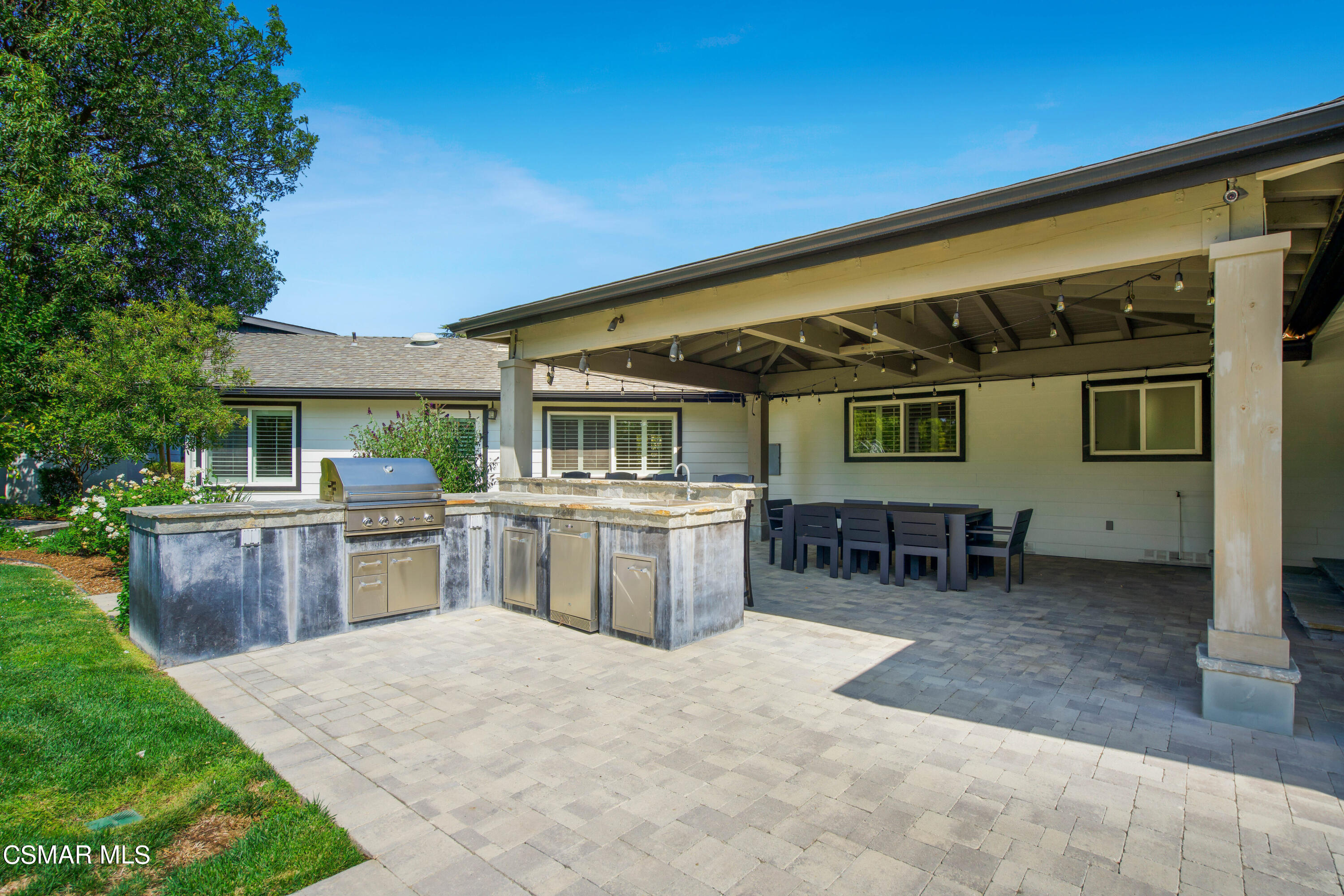 888 Rancho Road Thousand Oaks, CA 91362 - Photo 38 of 44 a backyard of a house with yard fire pit and outdoor seating