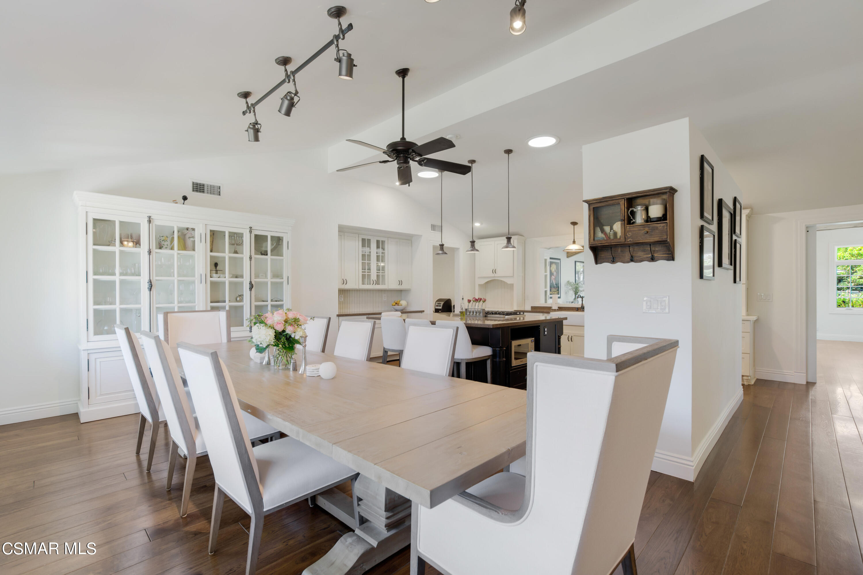 888 Rancho Road Thousand Oaks, CA 91362 - Photo 5 of 44 a view of a dining room with furniture wooden floor and chandelier