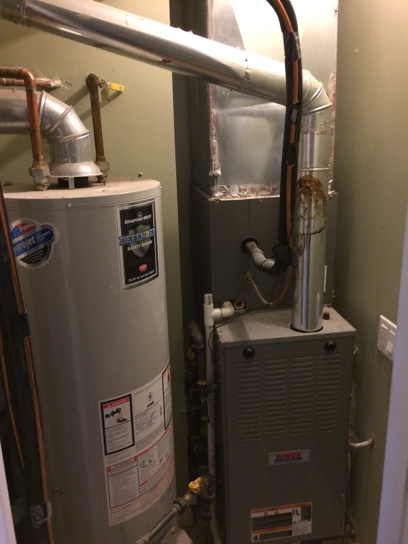 4407 West Adams Street Chicago, IL 60624 - Photo 8 of 10 a close view of water heater room