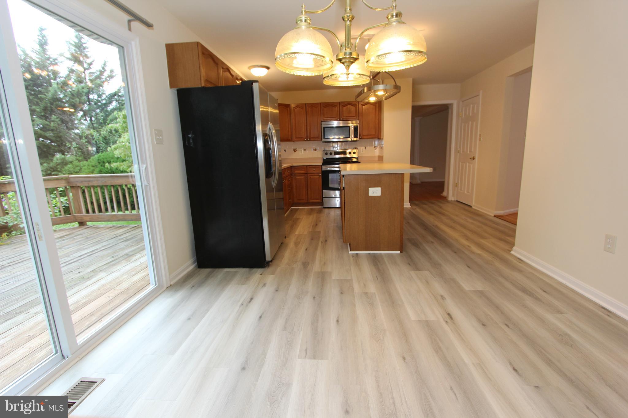 8301 Glen Heather Drive Frederick, MD 21702 - Photo 13 of 72 Family room view towards the kitchen