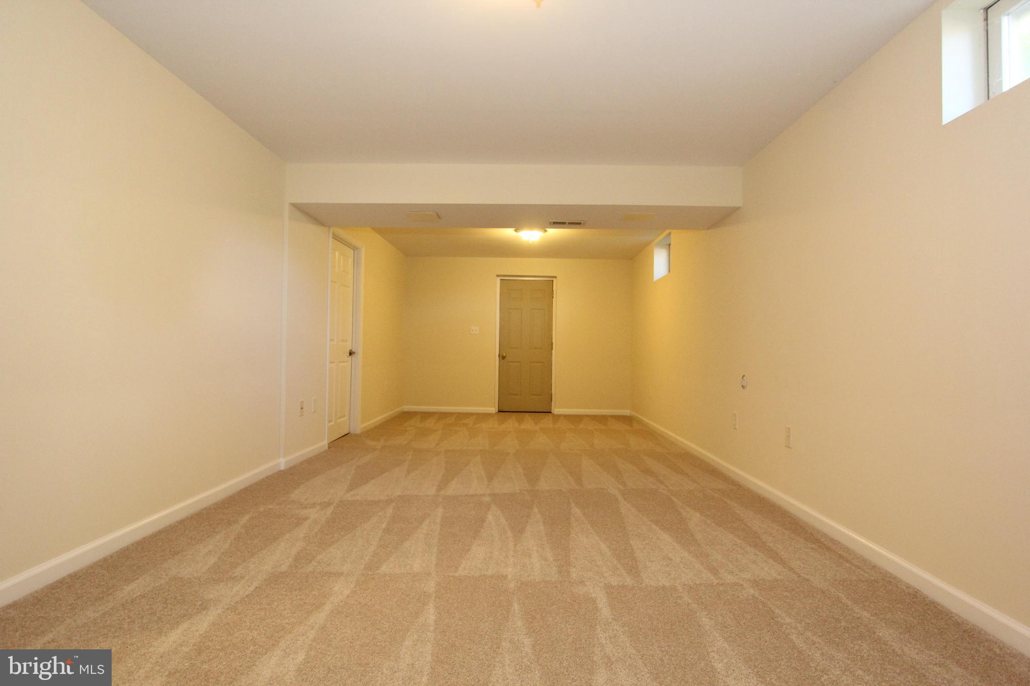 8301 Glen Heather Drive Frederick, MD 21702 - Photo 38 of 72 Huge lower level recreation room with new carpetin