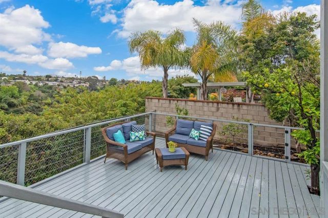a view of a roof deck with couches