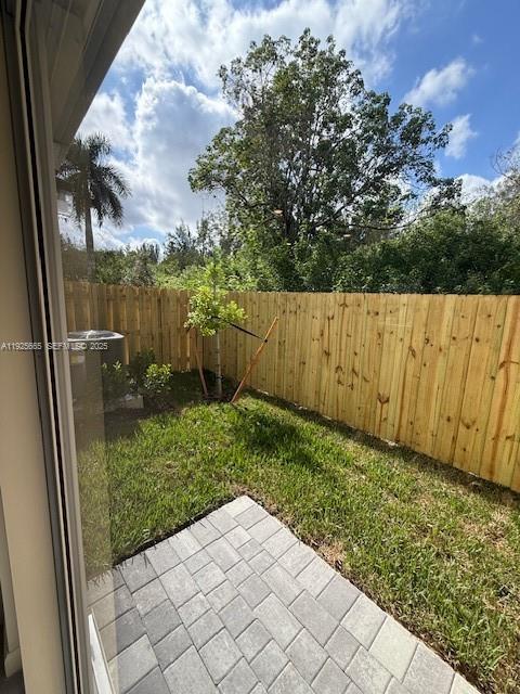 2763 Southeast 26th Road, Unit 2763 Homestead, FL 33035 - Photo 13 of 16 a view of backyard with green space