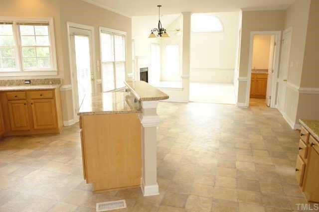 11623 Shavenrock Place Raleigh, NC 27613 - Photo 4 of 10 a view of a bathroom with a tub shower and sink