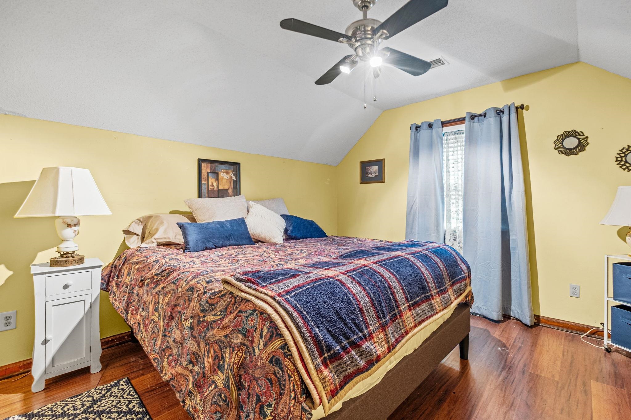 4572 Benoit Drive Memphis, TN 38141 - Photo 19 of 25 a bedroom with a bed dresser and a window