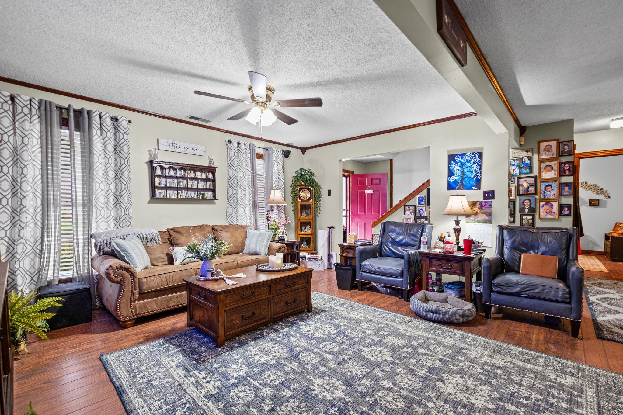 4572 Benoit Drive Memphis, TN 38141 - Photo 4 of 25 a living room with furniture and a rug