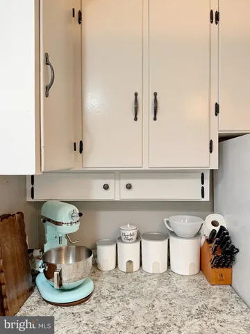 a workspace with furniture and window