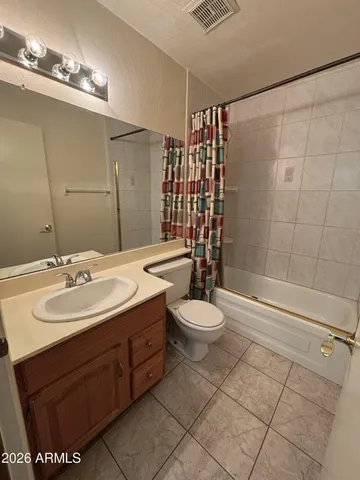 a view of an empty room with empty racks