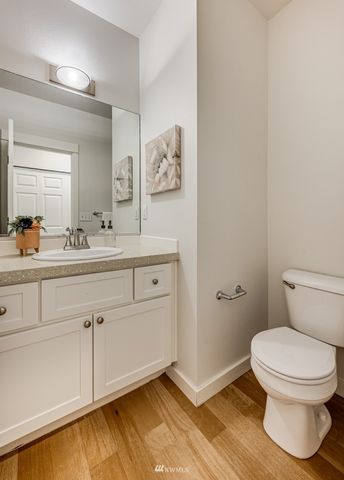 a view of storage and utility room with washer and dryer