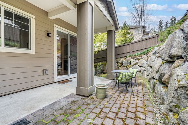 an aerial view of a house with a lake view