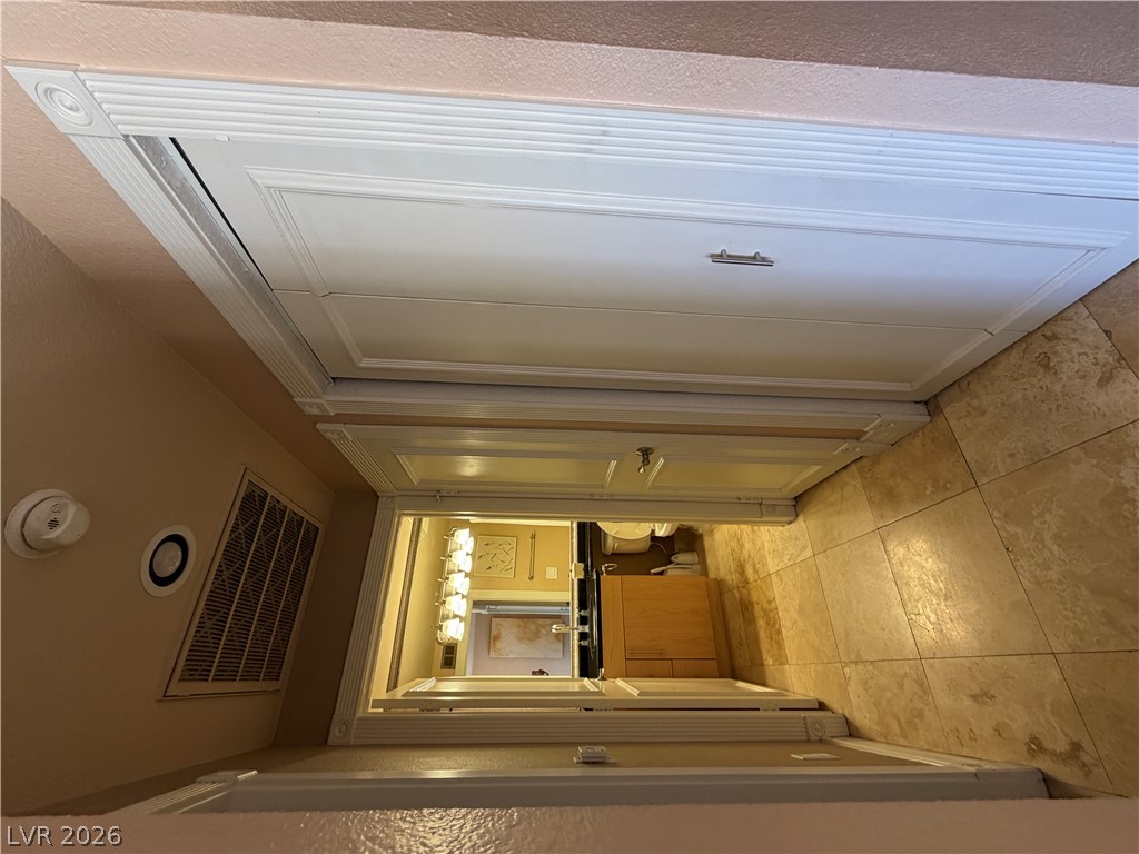 210 East Flamingo Road, Unit 426 Las Vegas, NV 89169 - Photo 14 of 17 Well-lit and functional, this bathroom offers practical design with an inviting atmosphere.