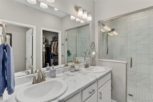 a bedroom with a bed and closet