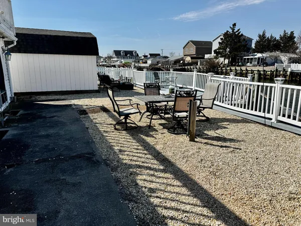 a view of a terrace with chairs