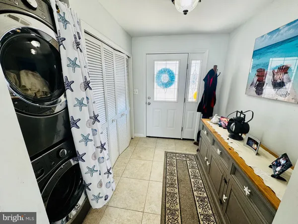 a view of a storage & utility room with a window