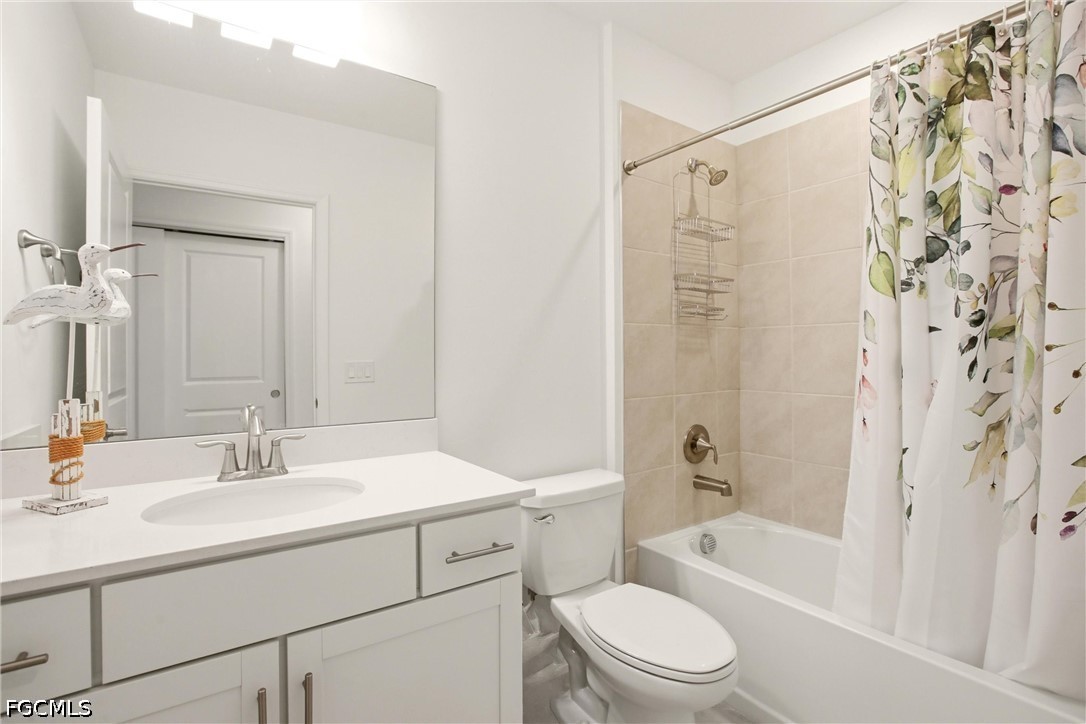 3751 Pebblebrook Ridge Court, Unit 101 Fort Myers, FL 33905 - Photo 29 of 48 a bathroom with a sink toilet and shower