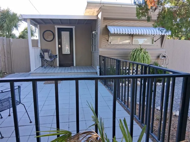 a view of a street with sitting area