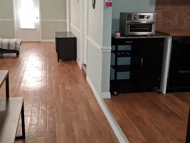 a view of a living room with furniture