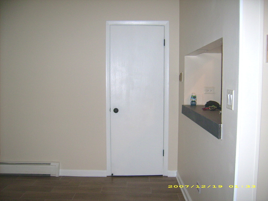 115 East Dundee Road, Unit 1S Wheeling, IL 60090 - Photo 7 of 12 a view of a room that has a window in it