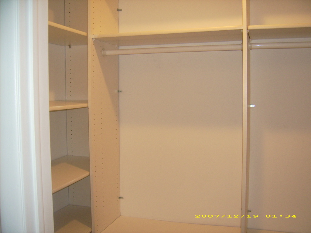 115 East Dundee Road, Unit 1S Wheeling, IL 60090 - Photo 8 of 12 a bathroom with a glass shower door