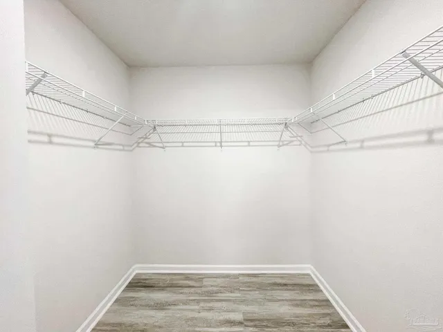 a view of a room with racks on the wall