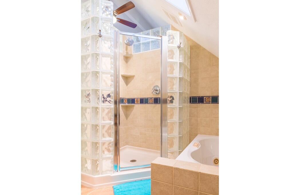 497 Sombrero Beach Road Marathon, FL 33050 - Photo 25 of 33 a bathroom with a bathtub and shower