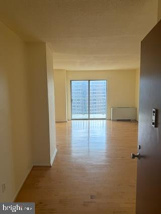1121 University Boulevard West, Unit 1312 Silver Spring, MD 20902 - Photo 4 of 17 Spacious entryway with natural light.