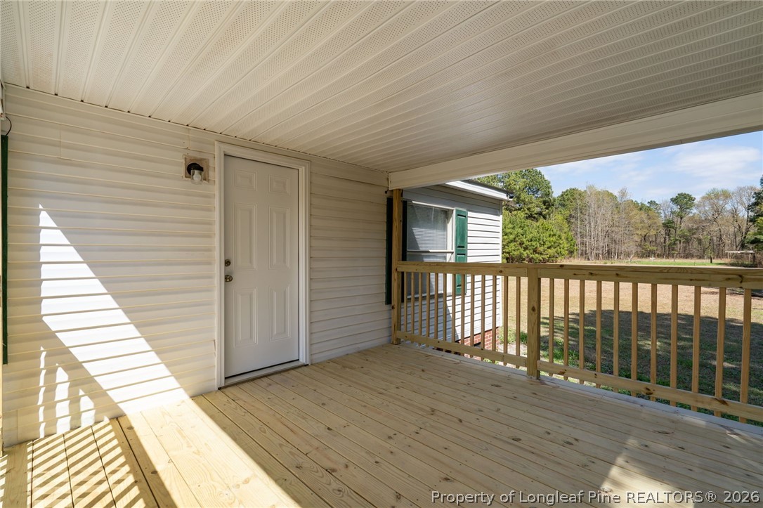 515 Mt Zion Road Red Springs, NC 28377 - Photo 27 of 50 a view of a balcony with wooden floor