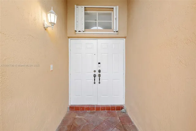 a view of walk in closet with window