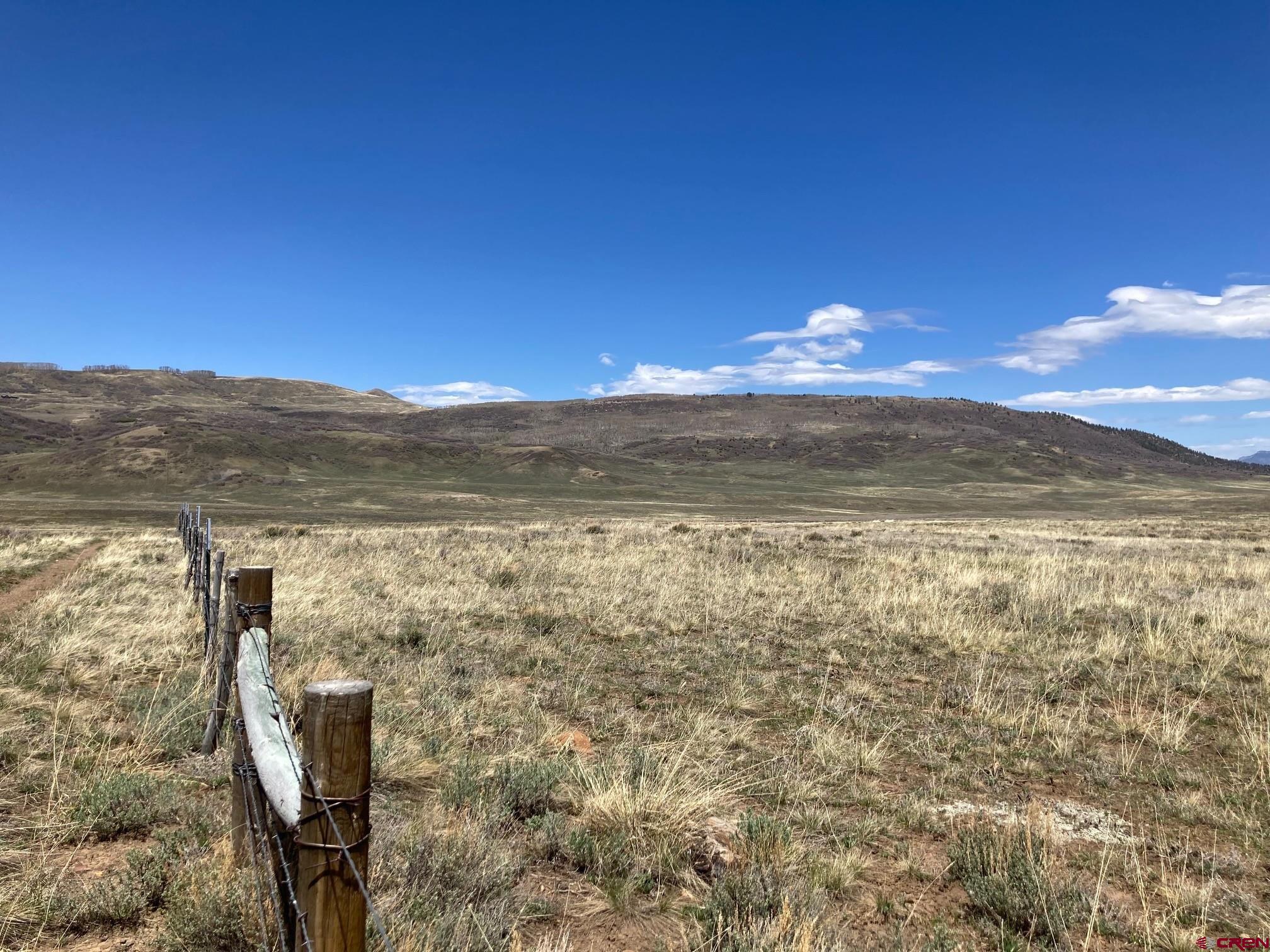 Lot 11 62x Road Placerville, CO 81430 - Photo 2 of 11 a view of a lake in middle of a field