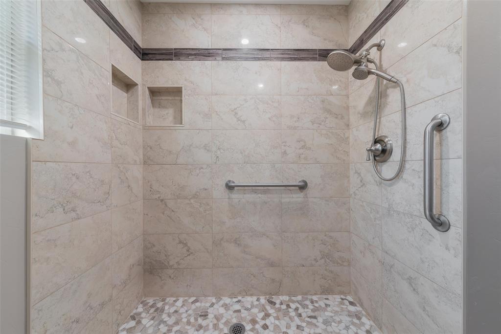 8461 Hunnicut Road Dallas, TX 75228 - Photo 20 of 30 a bathroom with a shower