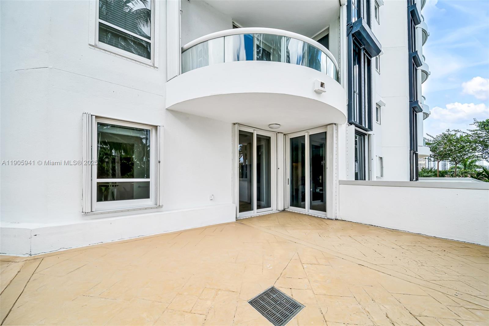 21050 Point Place, Unit 401 Aventura, FL 33180 - Photo 24 of 40 a view of white house with large windows