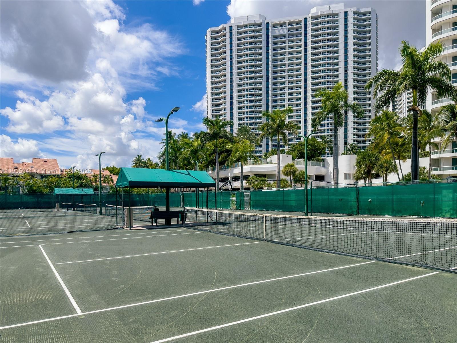 21050 Point Place, Unit 401 Aventura, FL 33180 - Photo 28 of 40 a view of a tennis court