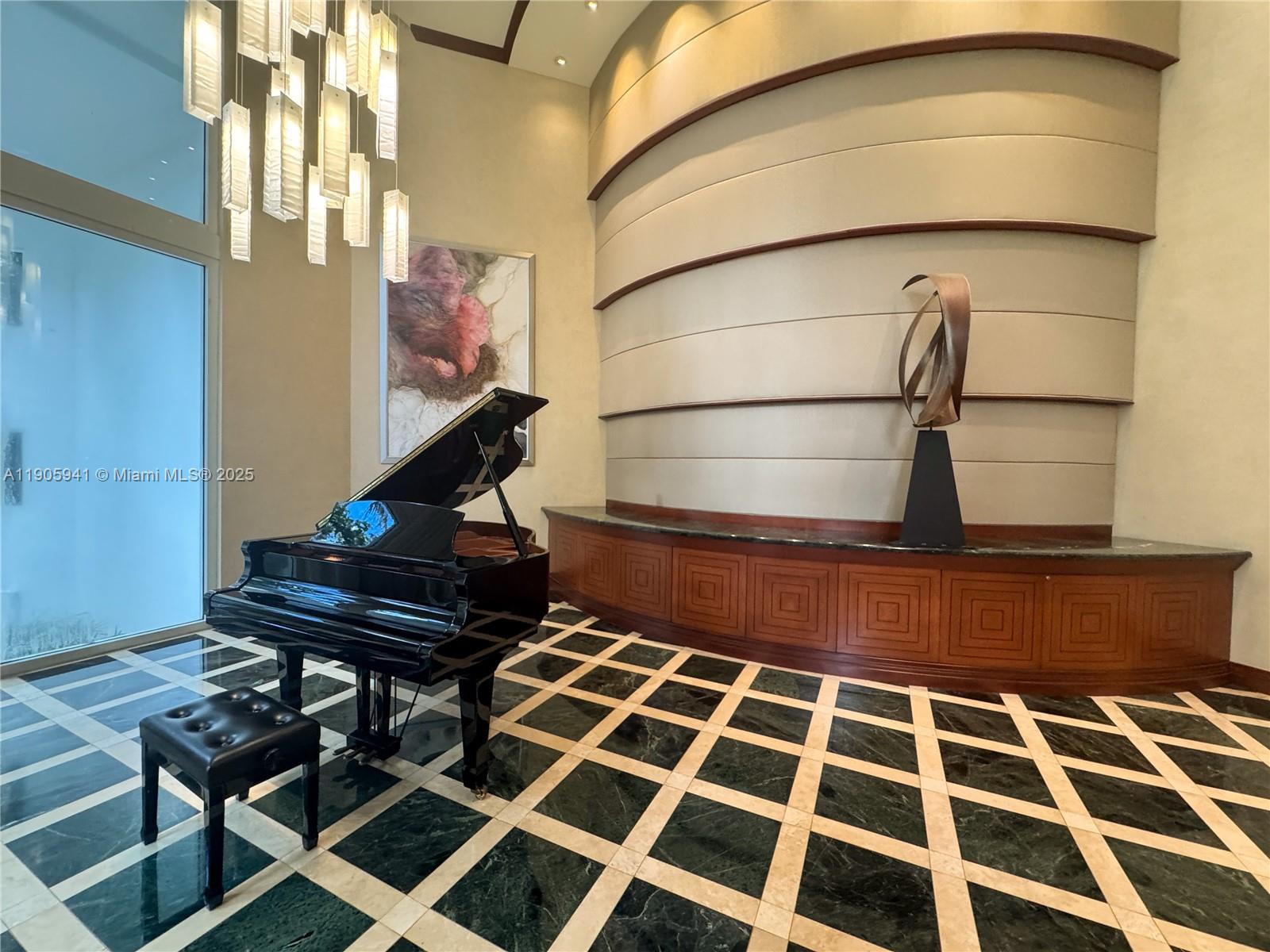 21050 Point Place, Unit 401 Aventura, FL 33180 - Photo 39 of 40 a black and white photo of a building