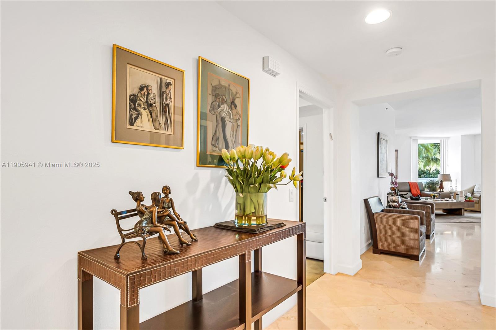 21050 Point Place, Unit 401 Aventura, FL 33180 - Photo 6 of 40 a view of a livingroom with furniture and a couch