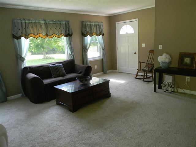 4349 Murfreesboro Road Franklin, TN 37067 - Photo 8 of 20 Another view of the Living Room showing the door leading to the front porch.