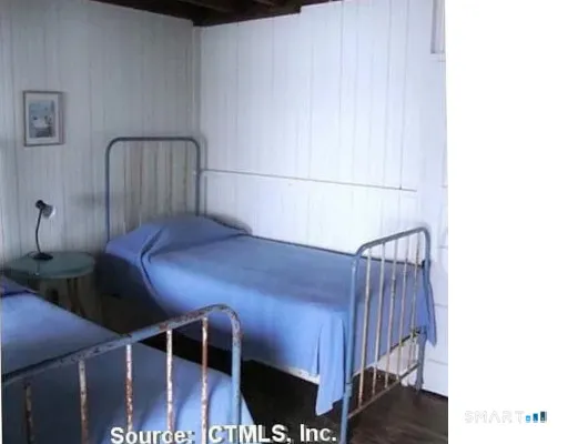 a view of balcony with wooden floor