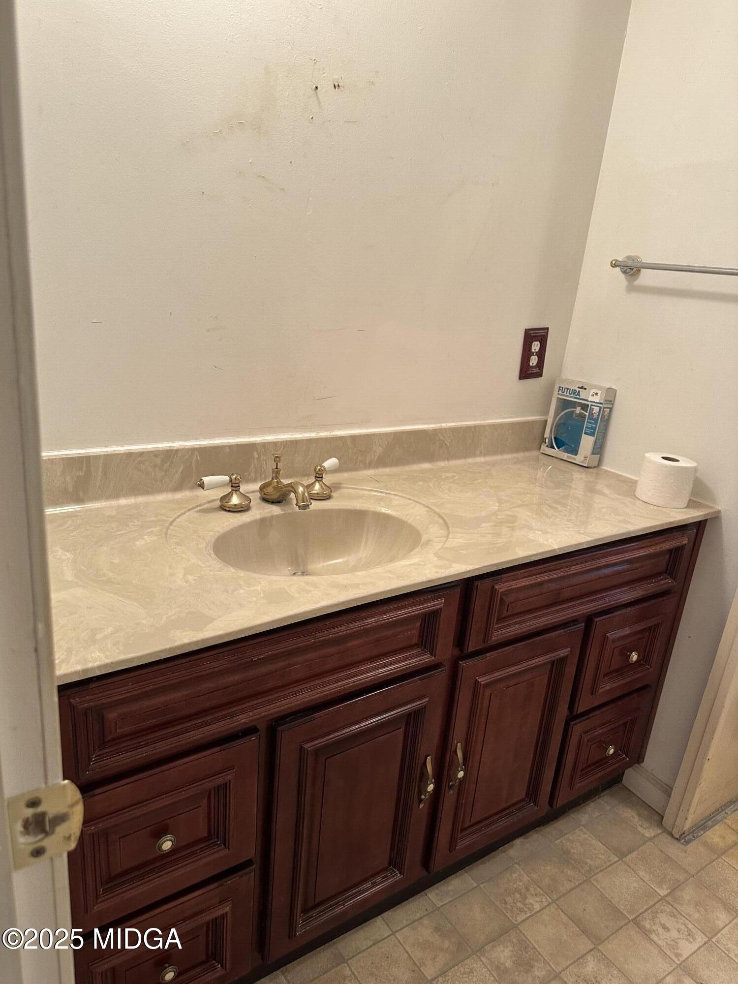 362 Old Macon Road Gray, GA 31032 - Photo 17 of 23 a bathroom with a sink and a mirror