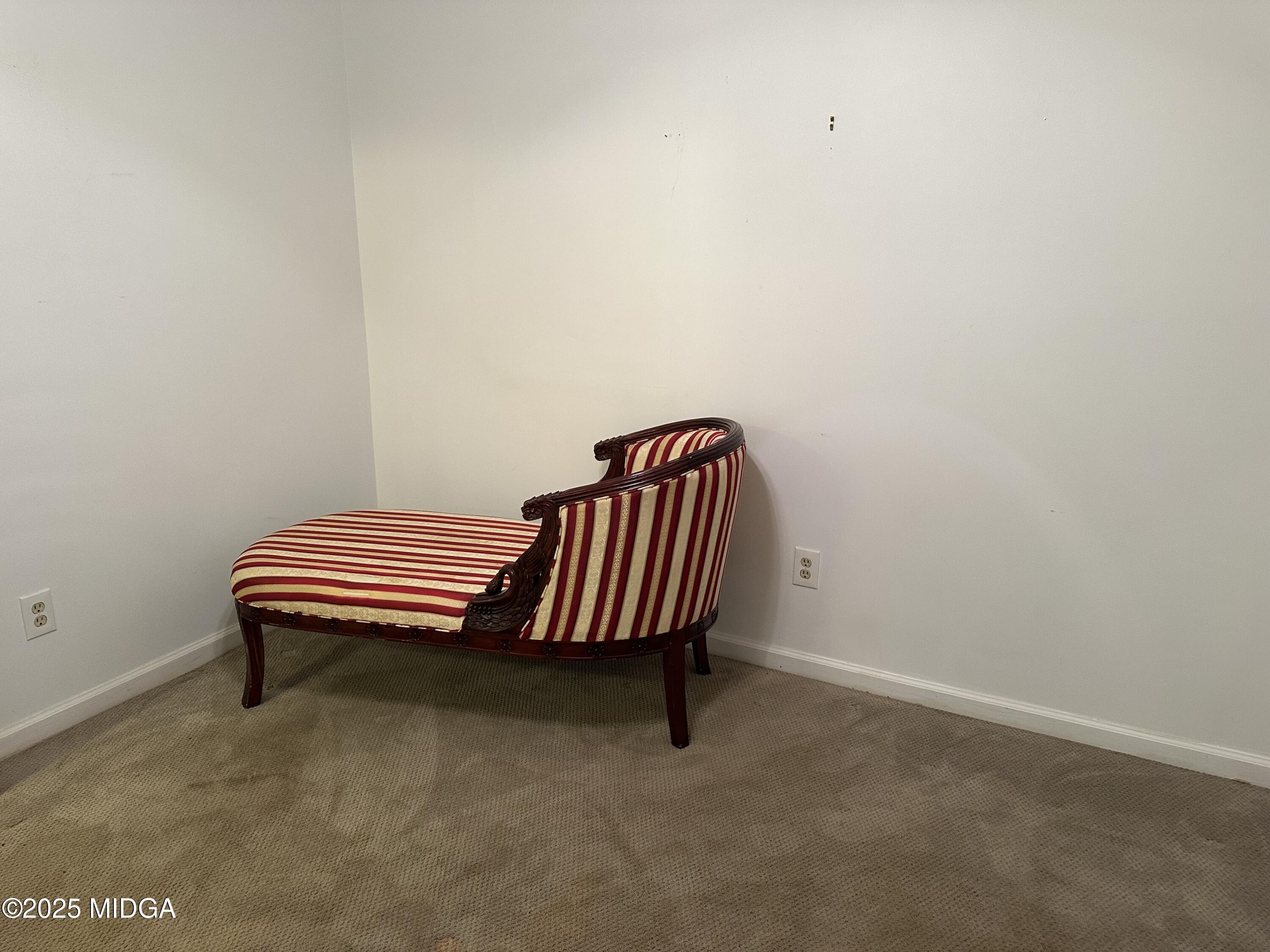 362 Old Macon Road Gray, GA 31032 - Photo 20 of 23 a room with a chair and wooden floor