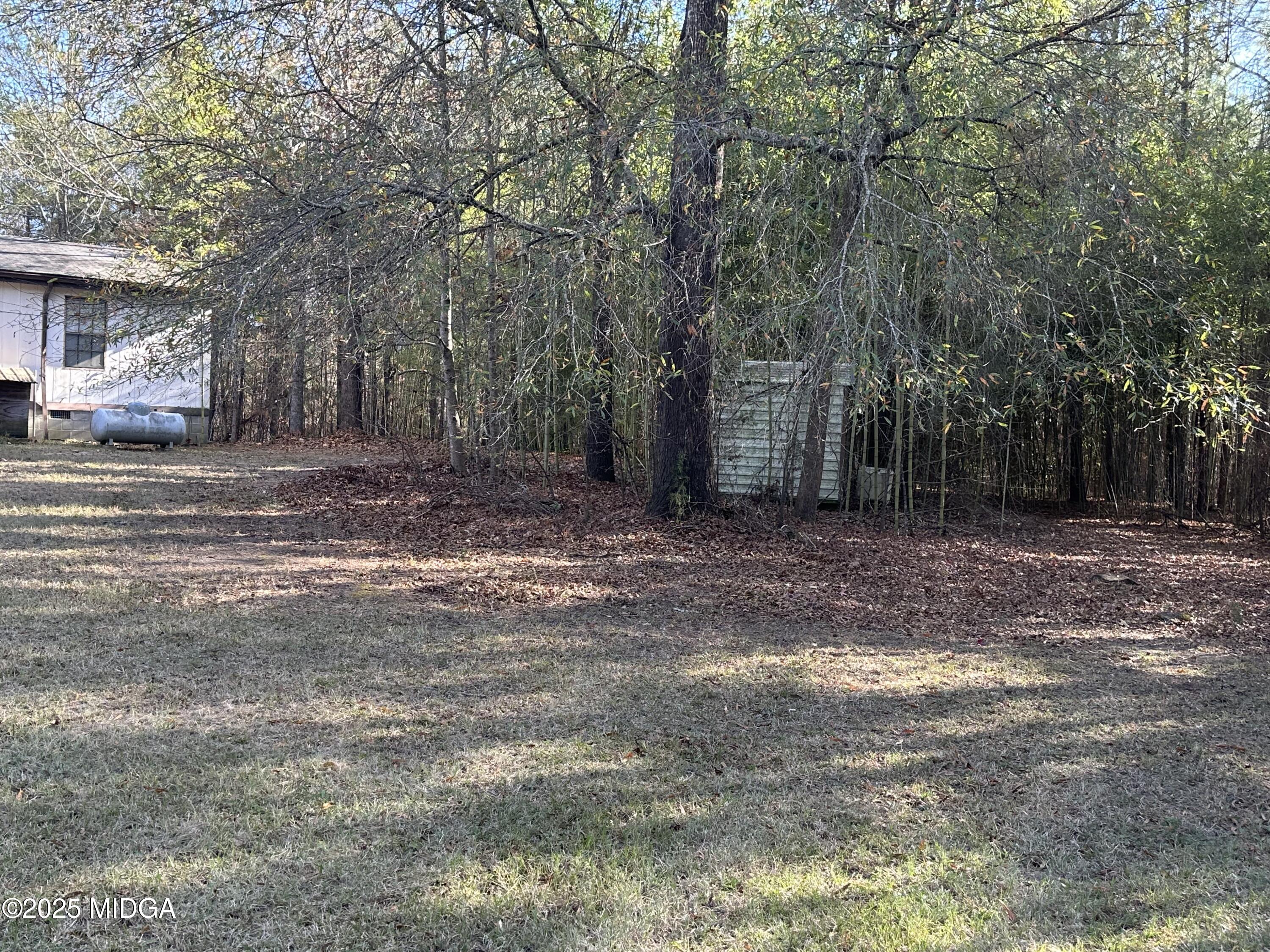 362 Old Macon Road Gray, GA 31032 - Photo 6 of 23 a view of a backyard with large trees