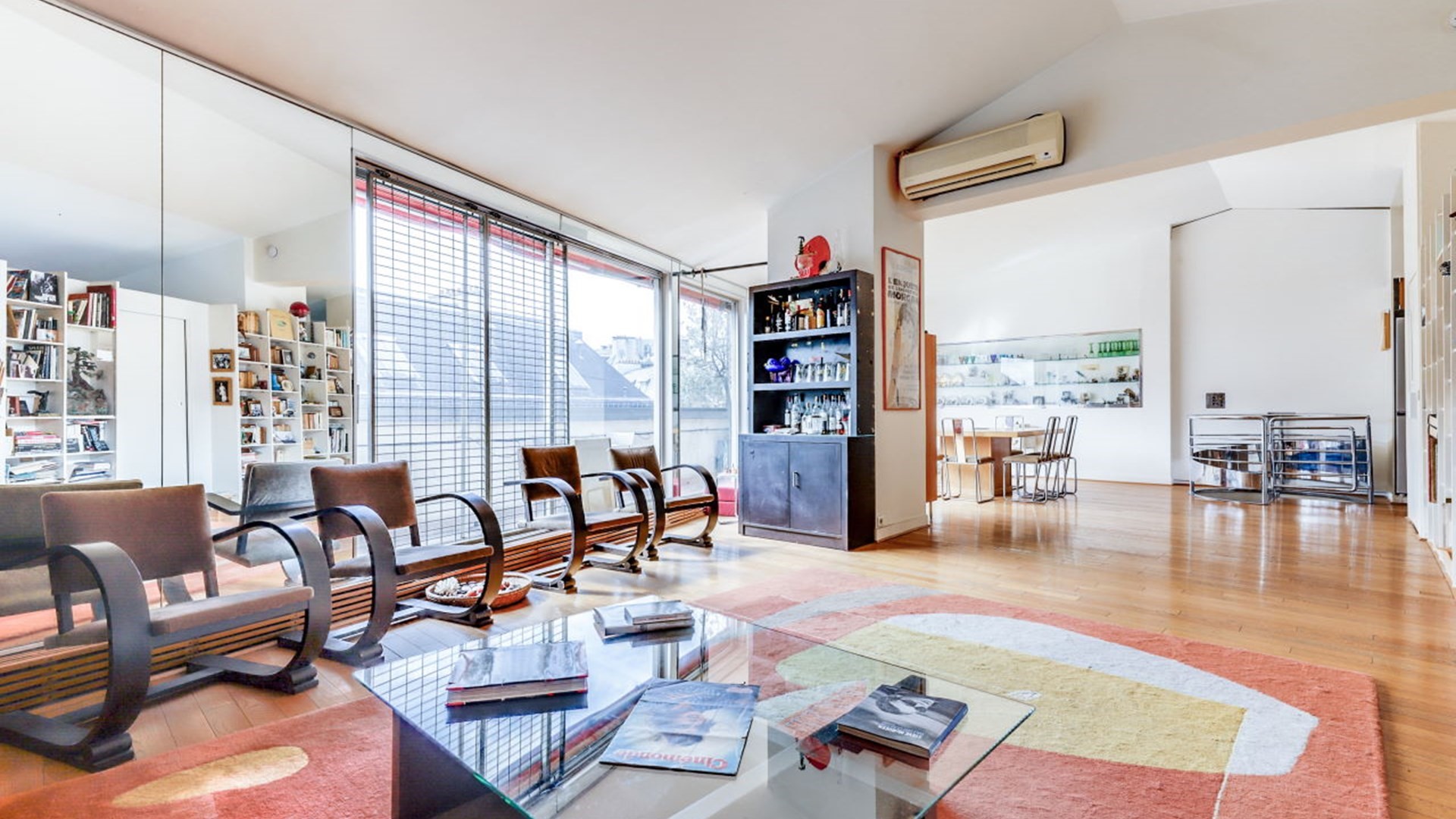 1208 Boulevard Street Carrollton, TX 75006 - Photo 2 of 10 a living room with furniture and a floor to ceiling window