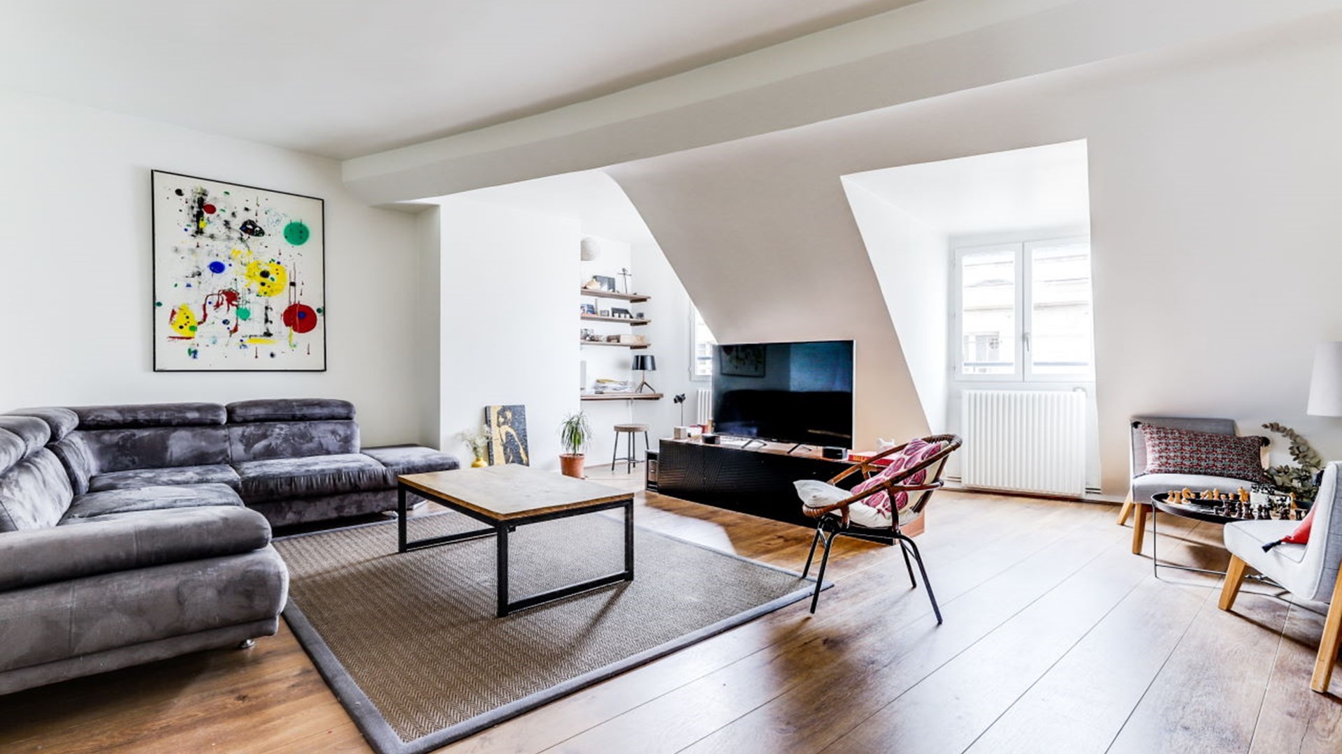 1208 Boulevard Street Carrollton, TX 75006 - Photo 3 of 10 a living room with furniture and a flat screen tv