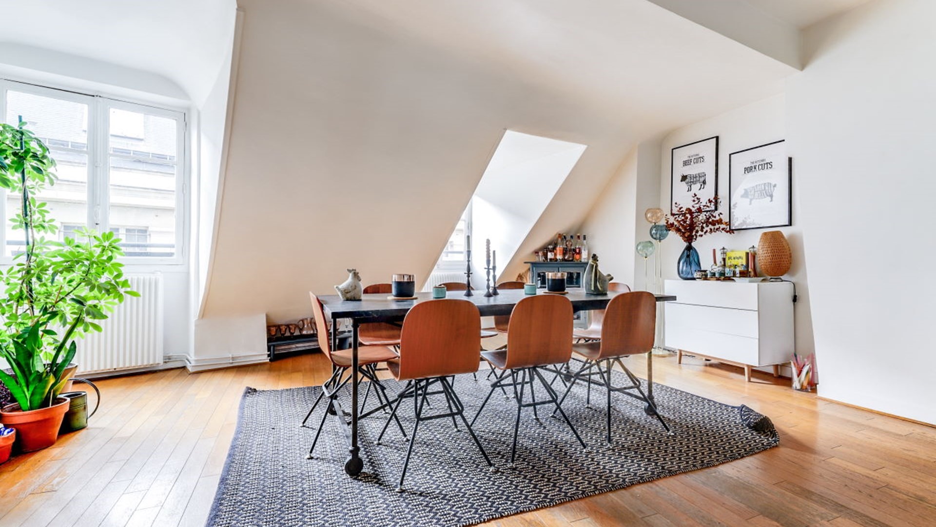 1208 Boulevard Street Carrollton, TX 75006 - Photo 5 of 10 a view of a dining room with furniture and wooden floor