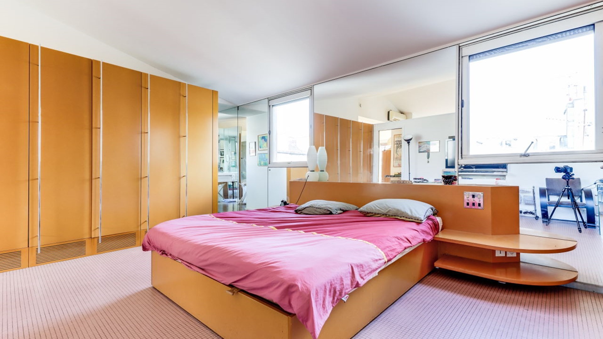 1208 Boulevard Street Carrollton, TX 75006 - Photo 7 of 10 a bedroom with a bed and large window