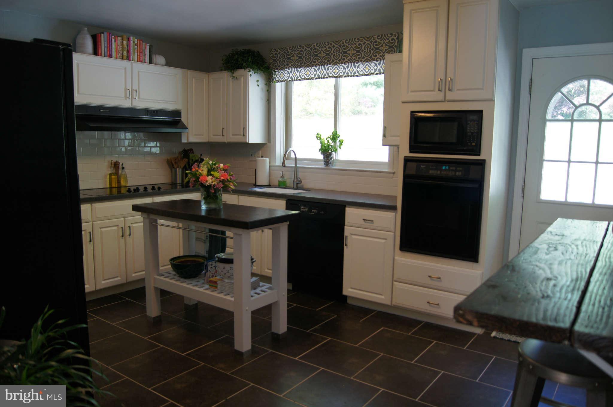 1908 Pot Spring Road Lutherville-Timonium, MD 21093 - Photo 12 of 30 New floor, backsplash, paint and more