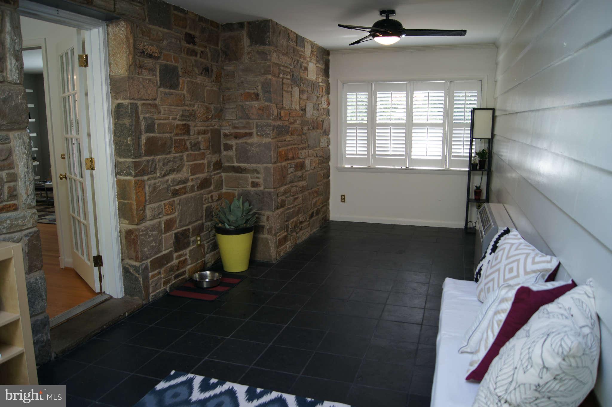 1908 Pot Spring Road Lutherville-Timonium, MD 21093 - Photo 15 of 30 Exposed stone wall, slate flooring