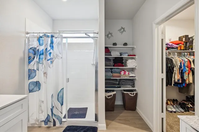a view of a kitchen with storage and utility